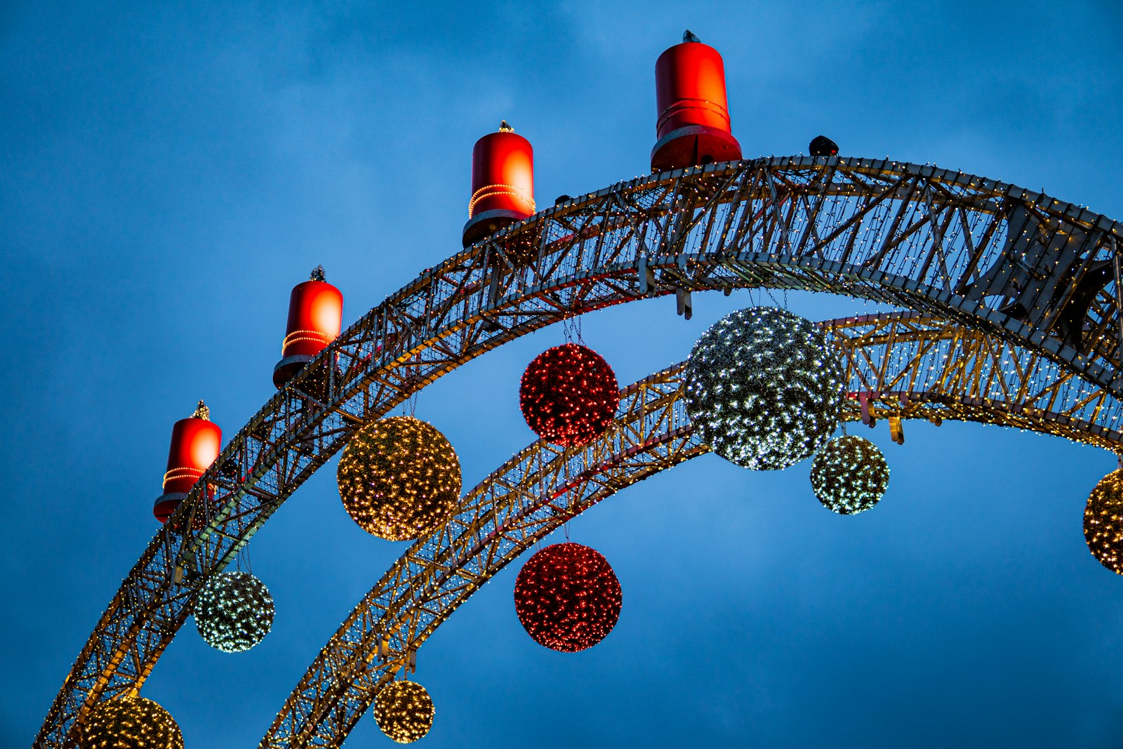 black and red ferris wheel under blue sky (How to Hang Christmas Lights) Without Damaging Your Roof or Trim