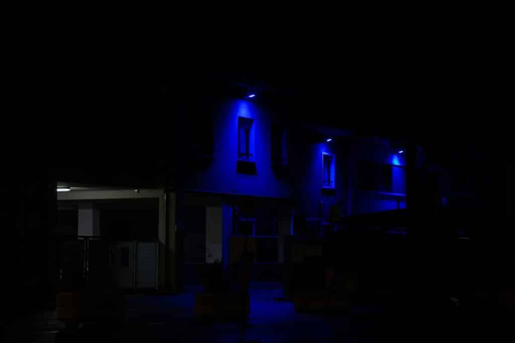 A couple of buildings that are lit up in the dark