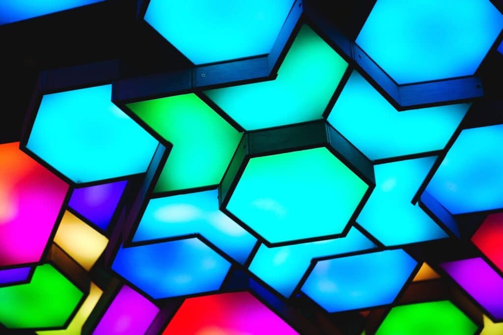 A colorful display of geometric ceiling lights creating a modern and artistic ambiance.