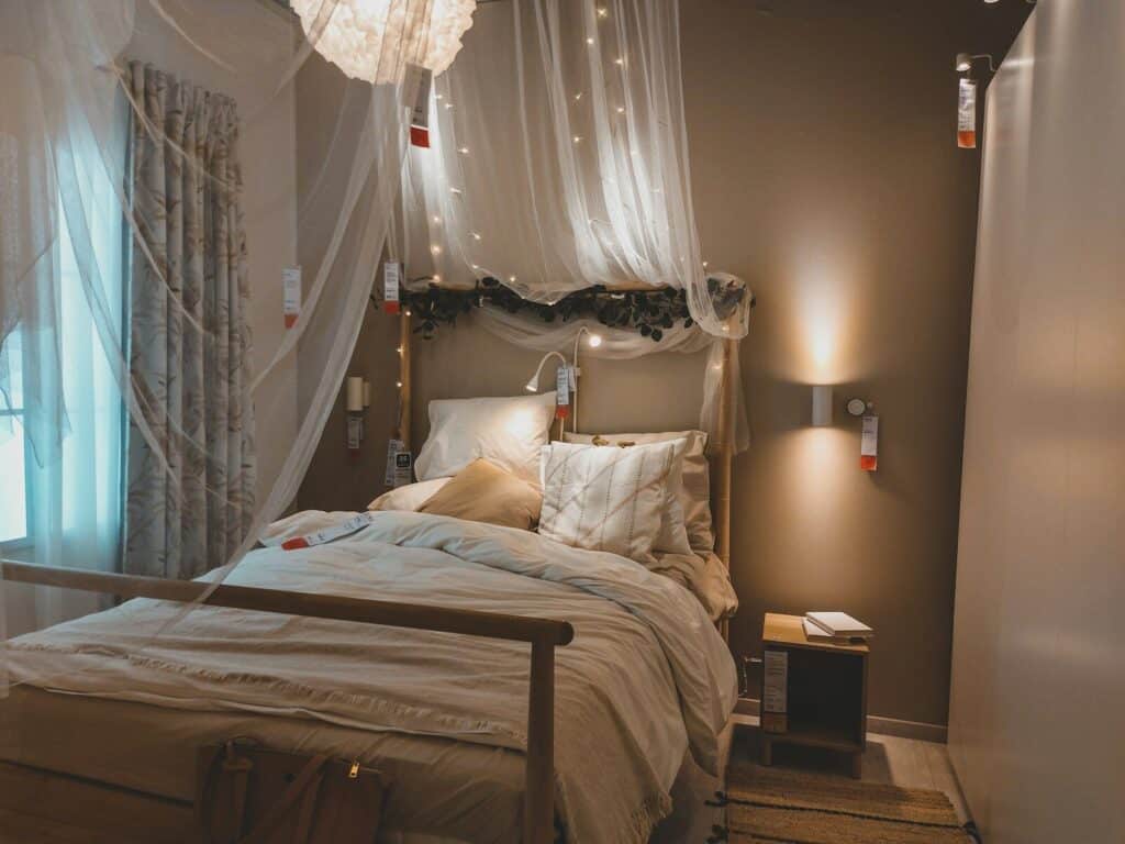 a bed with a white canopy over it
